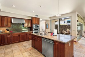 Townhome, Multiple Beds, Lanai, Garden View (Mauna Lani Villages 512) | Private kitchen | Coffee/tea maker, dining tables