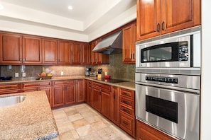 Townhome, Multiple Beds, Lanai, Garden View (Mauna Lani Villages 512) | Private kitchen | Coffee/tea maker, dining tables
