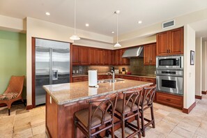 Townhome, Multiple Beds, Lanai, Garden View (Mauna Lani Villages 512) | Private kitchen | Coffee/tea maker, dining tables