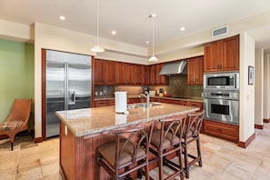 Townhome, Multiple Beds, Lanai, Garden View (Mauna Lani Villages 512) | Private kitchen | Coffee/tea maker, dining tables