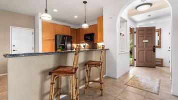 Townhome, Multiple Beds, Lanai, Golf View (Waikoloa Colony Villas 105) | Private kitchen | Dining tables