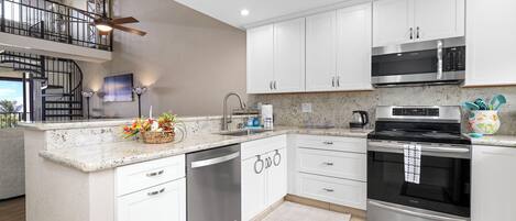 Condo, Multiple Beds, Kitchen, Ocean View (Country Club Villas 317) | Private kitchen | Coffee/tea maker, dining tables