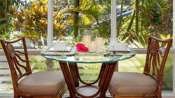 Condo, 1 King Bed, Lanai, Partial Ocean View (Kona Riviera Villas 106) | 1 bedroom, individually decorated, individually furnished, bed sheets