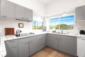 Condo, Multiple Beds, Lanai, Partial Ocean View (Vista Waikoloa D204) | Private kitchen | Coffee/tea maker, dining tables - Beautiful Mountain View - Concierge Included - Spacious! - Vrkcv (Waikoloa)