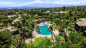 A resort with a central swimming pool, multiple villas, and lush greenery. - Walk to Restaurants/shopping - Excellent Golf Course Views - Private Beach Access - Vrkcv (Kamuela)