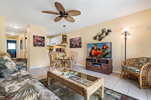 Condo, 1 King Bed with Sofa bed, Lanai, Garden View (Kona Isle B5) | Living area | 42-inch flat-screen TV with digital channels