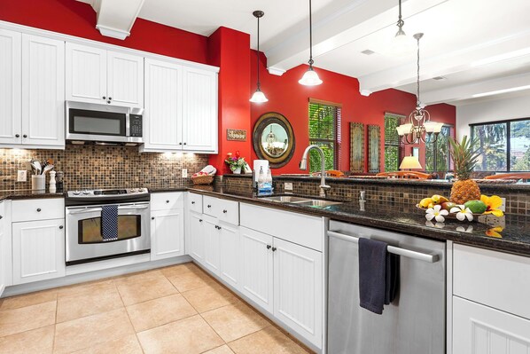 Townhome, Multiple Beds, Lanai, Garden View (Kulalani at Mauna Lani 2402) | Private kitchen | Coffee/tea maker, dining tables
