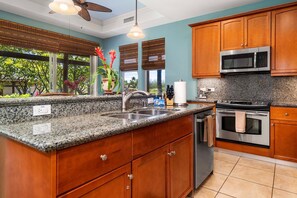Townhome, Multiple Beds, Lanai, Golf View (Mauna Lani Fairways 1101) | Private kitchen | Coffee/tea maker, dining tables