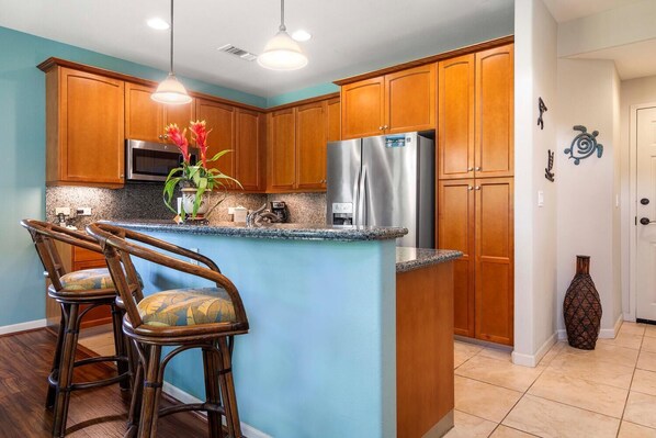 Townhome, Multiple Beds, Lanai, Golf View (Mauna Lani Fairways 1101) | Private kitchen | Coffee/tea maker, dining tables
