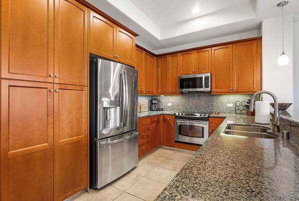 Townhome, Multiple Beds, Kitchen, Golf View (Mauna Lani Fairways 504) | Private kitchen | Coffee/tea maker, dining tables