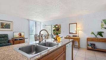 Condo, 1 King Bed with Sofa bed, Lanai, Garden View (Alii Villas 107) | Private kitchen | Coffee/tea maker, dining tables