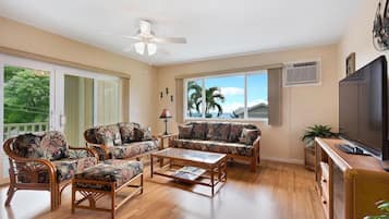 Condo, Multiple Beds, Lanai, Ocean View (Kahaluu Makai) | Living area | 55-inch flat-screen TV with digital channels