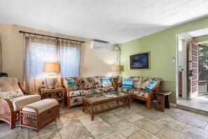 Townhome, Multiple Beds, Lanai, Garden View (Surf and Racquet 52) | Living area | 42-inch flat-screen TV with digital channels