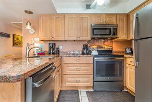 Condo, 1 King Bed, Lanai, Partial Ocean View (Casa de Emdeko 232) | Private kitchen | Coffee/tea maker, dining tables