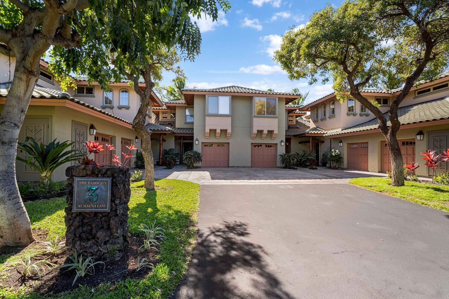 A residential area with a sign indicating "The Fairways at Mauna Lani, 3".