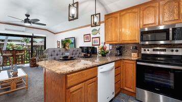 Condo, 1 King Bed with Sofa bed, Balcony, Partial Ocean View (Kona Isle B38) | Private kitchen | Dining tables