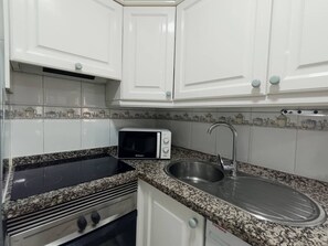 Microwave, stovetop, coffee/tea maker