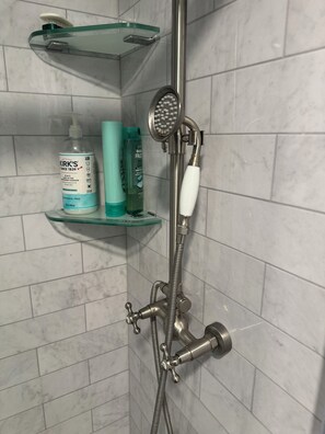 Shower, hair dryer, towels, soap