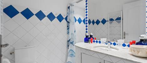 Hair dryer, towels, soap, shampoo