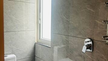 Hair dryer, towels, soap, toilet paper