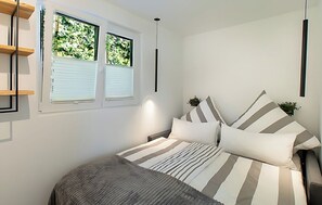 1 多间卧室、旅行婴儿床、免费 WiFi、床单