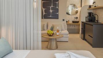 ห้องดีลักซ์สตูดิโอสวีท | บริเวณนั่งเล่น | ทีวีจอแบน