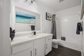 Hair dryer, towels, soap, toilet paper