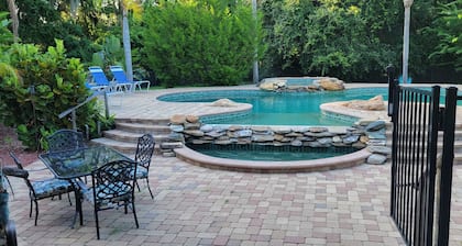 Spacious 5-bedroom house in charming New Smyrna Beach with WiFi, AC