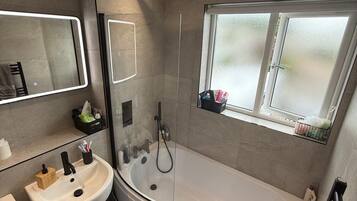 Shower, towels, soap, shampoo