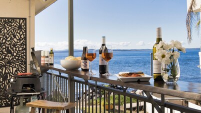 Sandy Point Escape - waterfront apartment, walk into pristine waters, walk to beach