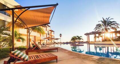 Chic Partial Ocean View Studio with Fitness Room, Pool, and WiFi in La Ventana!