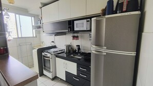 Private kitchen - Apartment with a great location in São José dos Campos, feel at home. (São José dos Campos)
