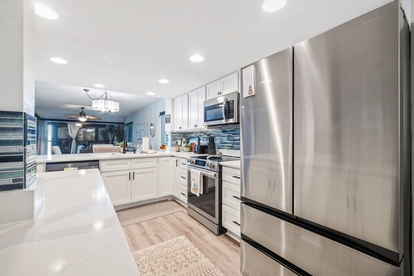 Fridge, microwave, dishwasher, coffee/tea maker