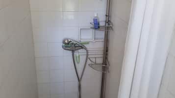 Hair dryer, bidet, towels, toilet paper