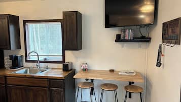 Fridge, microwave, coffee/tea maker, toaster