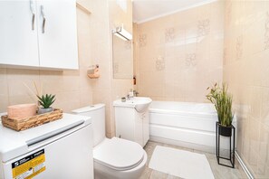 Hair dryer, towels, soap, toilet paper