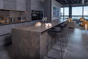 Apartment, 1 Bedroom, Balcony, City View | Private kitchen | Full-size fridge, microwave, oven, stovetop - The Halyard Apartments  (Cape Town)