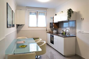 Fridge, oven, stovetop, espresso maker