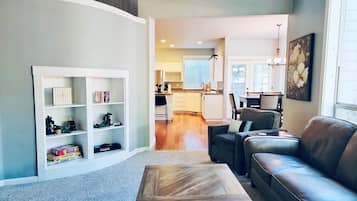 Smart TV, fireplace, books, offices