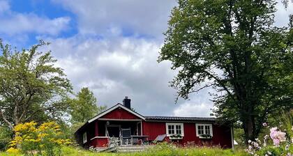 Top renovated red vacation home in Ädelfors by the river Emån, in Småland.