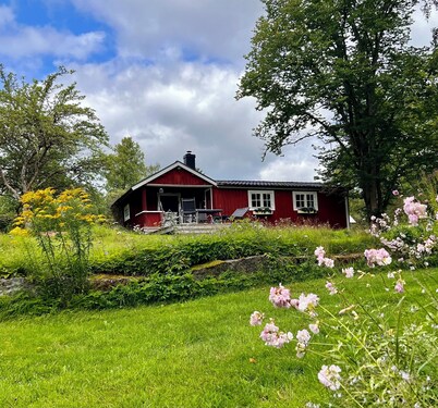 Top renovated red vacation home in Ädelfors by the river Emån, in Småland.
