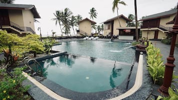 Outdoor pool, open 7:00 AM to 7:00 PM, sun loungers, lifeguards on site