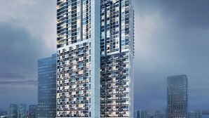 A modern high-rise hotel with multiple floors, large windows, and a prominent entrance at the base. - The Colony and the Luxe Infinity Pool (Kuala Lumpur)