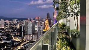 A cityscape with high-rise buildings and a clear sky. - The Colony and the Luxe Infinity Pool (Kuala Lumpur)
