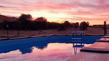 Seasonal outdoor pool, pool umbrellas, sun loungers