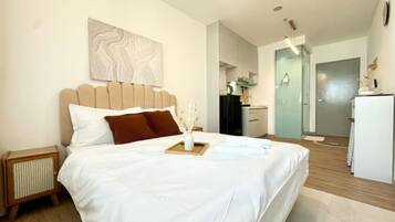 Superior Studio, 1 Queen Bed, Balcony, City View | Desk, laptop workspace, free WiFi, bed sheets