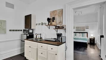 Fridge, microwave, stovetop, coffee/tea maker