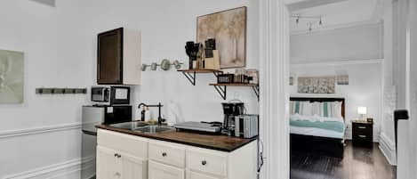 Fridge, microwave, stovetop, coffee/tea maker