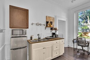 Fridge, microwave, stovetop, coffee/tea maker