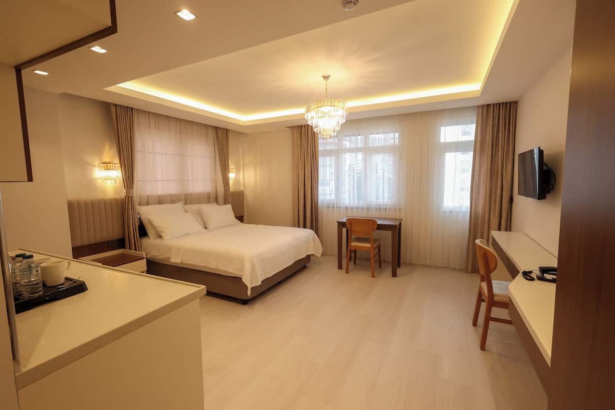 Comfort Double Room, City View | In-room safe, desk, laptop workspace, blackout drapes